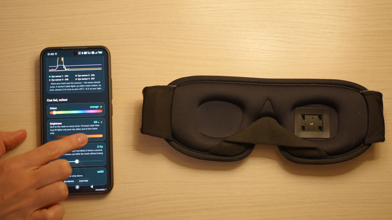 Adjusting cue settings beside Somni Mask